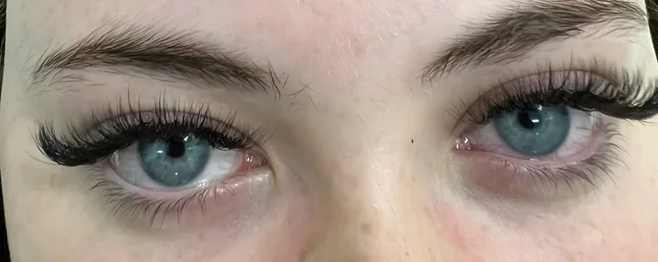 Volume lash extensions on blue eyes